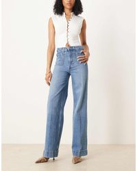 ASOS - Asos Design Tall High Waist Wide Leg Jeans With Front Pockets In Mid Blue - Lyst