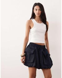 ARKET - Utlility Bubble Mini Skirt - Lyst