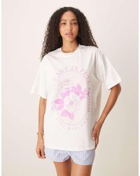 ASOS - T-Shirt Oversize Color Panna Con Grafica Di Fiori Lilla - Lyst