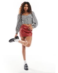 Monki - – langärmlige seersucker-bluse mit knopfleiste vorne und -weißem vichy-karomuster - Lyst