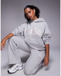 Kaiia - Sweat à capuche d'ensemble oversize avec logo brodé - clair et rose - Lyst