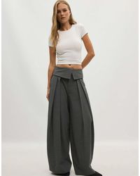 Stradivarius - Wide-Leg Trousers With Turned-Up Waistband - Lyst