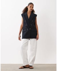ASOS - Blazer ajusté sans manches à double boutonnage et épaulettes - Lyst