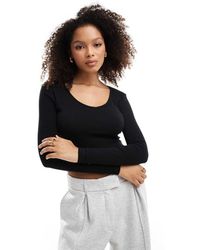 ONLY - Top A Maniche Lunghe A Coste Con Scollo A V - Lyst