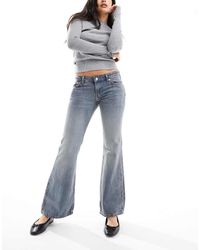 Weekday - Vaqueros Bootcut Azul Grisáceo De Corte Slim Y Talle Bajo Nova De - Lyst