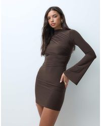 Kaiia - Exclusive Double Sculpted Slinky Asymmetric Shoulder Flare Sleeve Mini Dress - Lyst