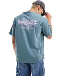 Timberland - T-shirt oversize blu con stampa grande di montagne sulla schiena - Lyst