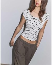 Stradivarius - Multi-position Polka Dot Sleeveless Top - Lyst