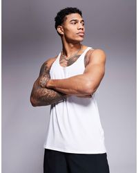 4505 - Icon Performance Jersey Quick Dry Stringer Tank Top - Lyst