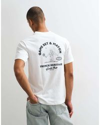 Lacoste - Tennis Heritage T-Shirt Met Badge-Accent En Graphic Op De Achterkant - Lyst