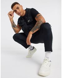 camiseta tirantes reebok hombre