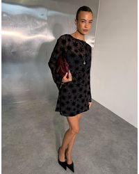 Never Fully Dressed - Mini-kleid aus beflocktem mesh mit u-boot-ausschnitt und ausgestellten ärmeln - Lyst