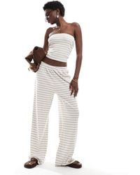 Vero Moda - – hose aus geripptem jersey mit streifen - Lyst