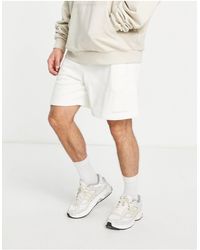 adidas Originals - X pharrell williams - pantaloncini premium basic sporco - Lyst
