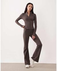Tala - Dayflex Wrap Flared Yoga Pant - Lyst
