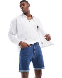JJ Rebel - Short en jean à revers - denim moyen - Lyst