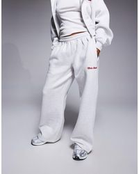 Kaiia - Petite Cotton Rich Cherry Bow Back Pocket Detail Wide Leg Sweatpants - Lyst