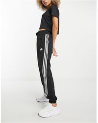 adidas Originals - Adidas - training train icons - joggers neri con 3 strisce - Lyst