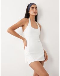 4505 - Active Halterneck Tennis Dress With Under Shorts - Lyst