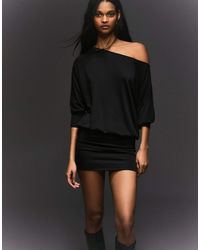 Combinaison longue et ajustée ornée Bershka en coloris Noir