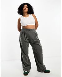 ASOS - Asos design curve - pantaloni a fondo ampio a pieghe grigi a righe - Lyst