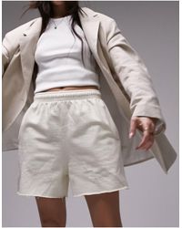 TOPSHOP - Studio projects 1998 - pantaloncini da jogging lavaggio vintage color avena con fondo grezzo - Lyst