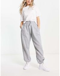 Nike - Phoenix Fleece Oversized High Rise Joggers - Lyst