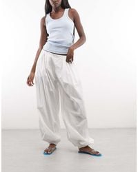 Weekday - Pleated Balloon Trousers - Lyst