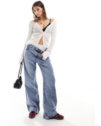 Monki - Naoki - jeans ampi a vita bassa color medio slavato - Lyst