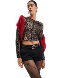 Stradivarius - – kurz geschnittene strickjacke mit leopardenmuster - Lyst