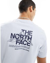 The North Face - Camiseta azul claro con estampado - Lyst