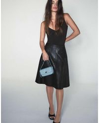 Stradivarius - Leather Effect Flared Midi Skirt - Lyst
