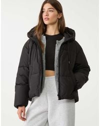 Stradivarius - Oversized Gewatteerd Jack Met Capuchon - Lyst