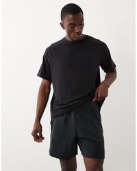 4505 - Yoga Ultra Soft Modal Blend Training Shorts With Zipper Pockets - Lyst