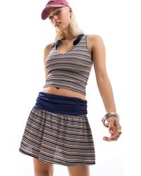 Collusion - Mini-jupe d'ensemble style tennis à rayures et taille à rabat - Lyst