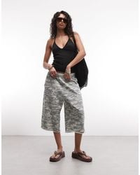 Collusion - – weite longline-shorts aus jersey mit verwaschenem military-muster - Lyst