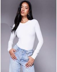 GOOD AMERICAN - Sculpting Crewneck Bodysuit - Lyst