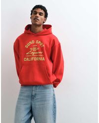 ASOS - Oversized Hoodie With Front Pigment Print - Lyst