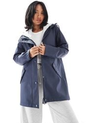 Vero Moda - Raincoat With Hood - Lyst