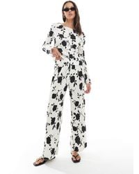 Vero Moda - Pantalon d'ensemble plissé coupe ample à imprimé fleurs - et noir - Lyst