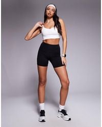4505 - Icon Running Medium Support Sports Bra With Adjustable Straps - Lyst