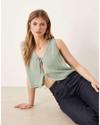 ASOS - Top Verde Salvia Sin Mangas Con Cuello De Pico Y Lazadas Delanteras De Punto De - Lyst