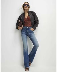 River Island - Washed Sculpt Flare Jeans - Lyst