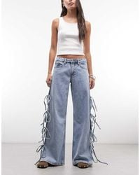 Monki - Low Waist Wide Leg Jeans With Side Tie Bow Detail - Lyst
