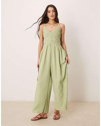 ASOS - Mono Largo Con Cintura Baja Y Cuello De Pico De Tejido Rugoso De Poliéster De -Verde - Lyst