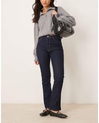 ASOS - Mid Rise Bootcut Flare Jean With Comfort Stretch - Lyst