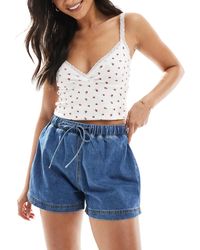 ASOS - Short en jean à enfiler style jogging - moyen - Lyst