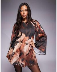 ASOS - Mono Corto En Tonos Oscuros De Manga Larga Con Estampado Abstracto Y Cuello Alto De Satén De - Lyst