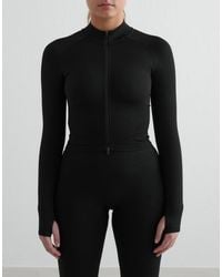 Aim'n - Giacca Nera Modellante Con Zip Senza Cuciture - Lyst