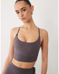 4505 - Light Support Sports Bra With Removable Padding - Lyst